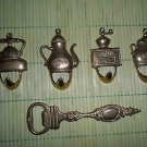 Motivküchenhaken aus Messing