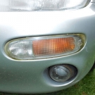Mazda MX 3 Blinker vorne links / Teileträger/Bj. 1998/136000 Km