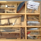 Altes Uhrmacherwerkzeug, verschiedene Teile