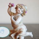 Porzellanfigur Mädchen mit Vogel und Blumen, Bienenkorb-Marke