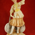 Gebruder Heubach 11¼" Bisque Girl in Dress with Bicycle Figurine - 25K - Germany